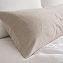 Close-up of oat washed linen euro sham stitched seam