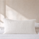 White French flax linen euro sham layered on bed
