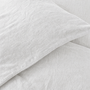 Close-up of French flax linen pillowcase texture and organic weave detail